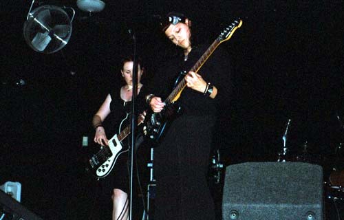 Suzi tries her hand at guitar for the first time onstage... made a great noise.